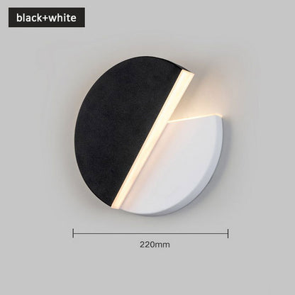 Rotating round LED wall light