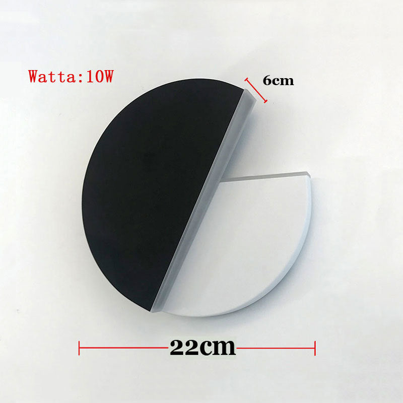 Rotating round LED wall light