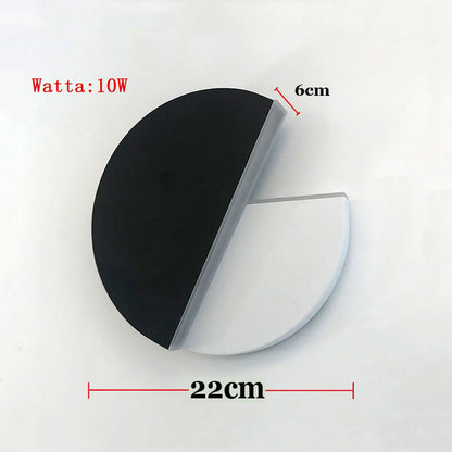 Rotating round LED wall light