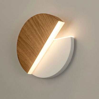 Rotating round LED wall light