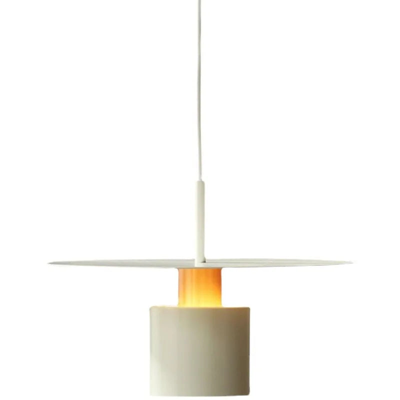 Modern Black Disc and Cylinder Pendant Light with Copper Glow for Bedside