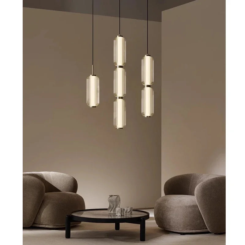 Modern Stacked Ribbed Glass Capsule Pendant Light in Black and Copper
