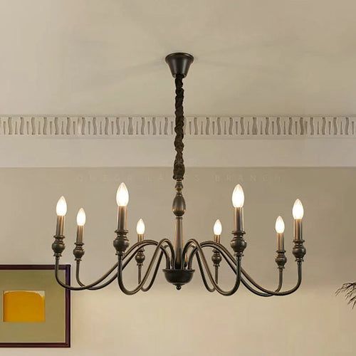 Candelabro de hierro negro con detalles de cristal