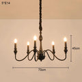 Candelabro de hierro negro con detalles de cristal