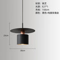 Modern Black Disc and Cylinder Pendant Light with Copper Glow for Bedside